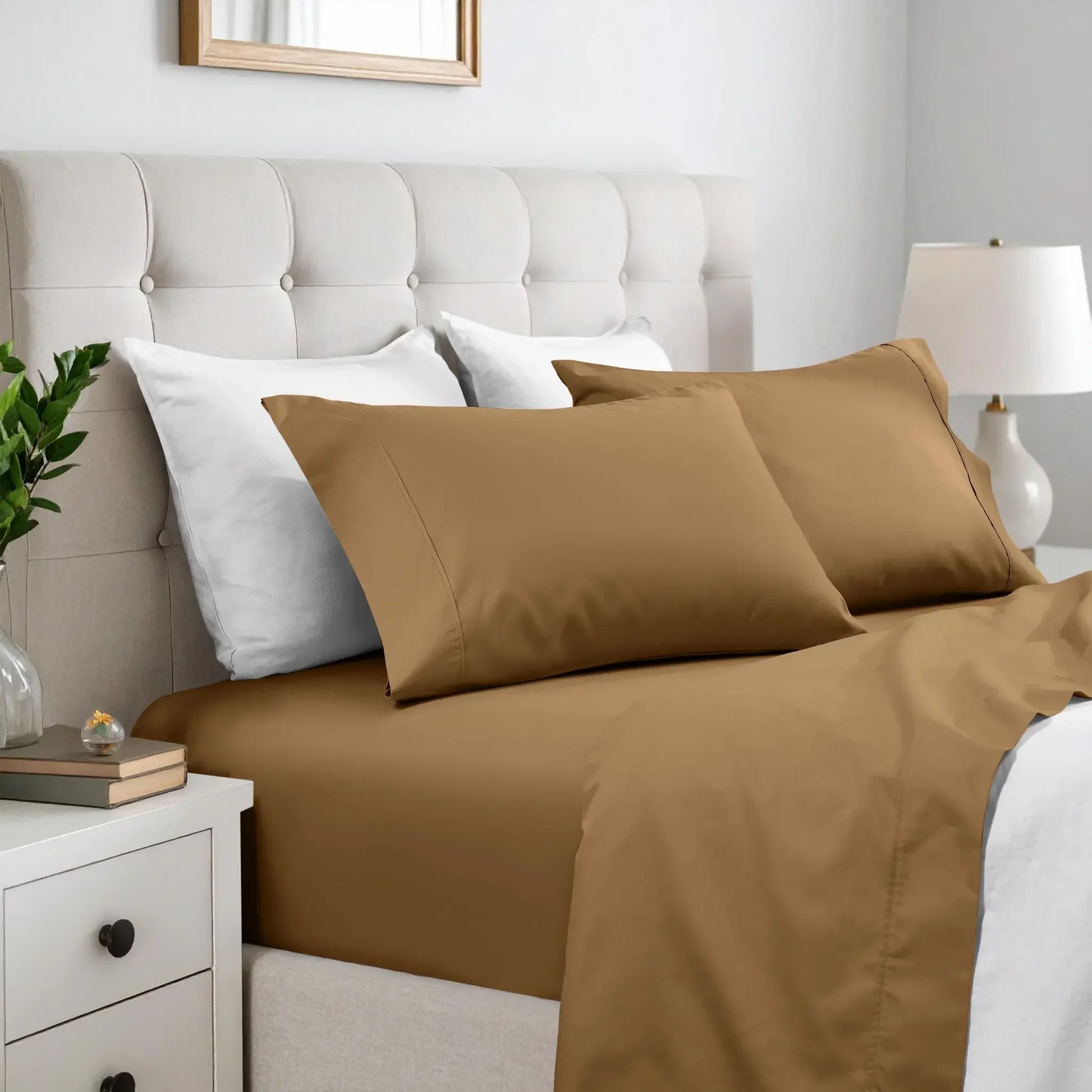 Taupe brown 600 thread count cotton blend bed sheet set on a neatly made bed
