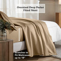 Taupe deep pocket fitted sheet showing an 18-inch mattress fit feature