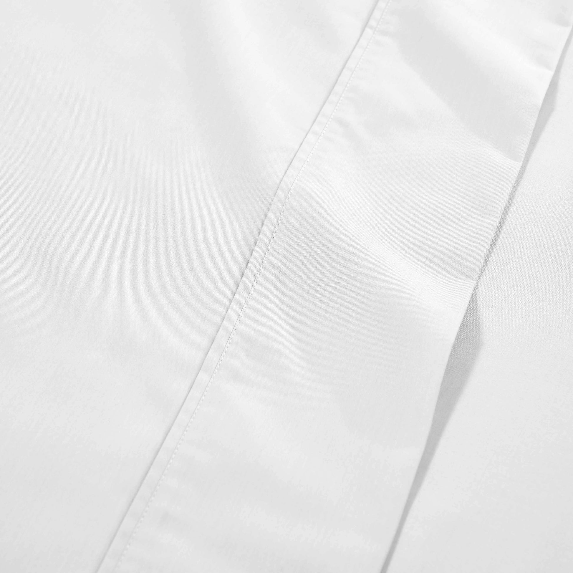 White 1000 Thread Count Cotton Blend Sheets Set solid deep pocket hemline and stitching close-up fabric texture