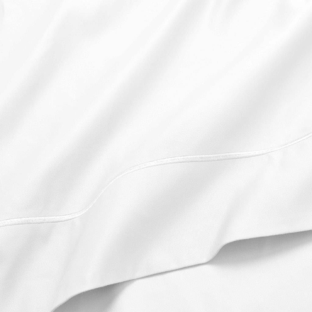 White 1500 Thread Count Egyptian Cotton Sheets hotel quality embroidered hemline stitch close-up.