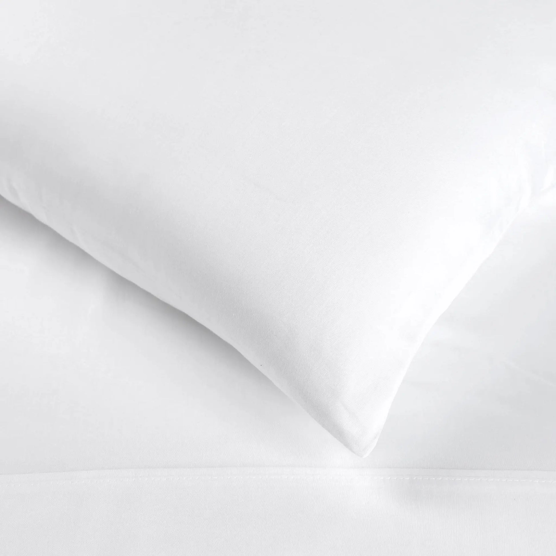 White 700 Thread Count Egyptian Cotton Sateen sheet fabric texture close-up